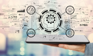 Tablet mit digitaler KI-Visualisierung und vernetztem Zahnradsymbol als Symbol für Künstliche Intelligenz.